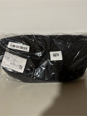Black Packable crossbody bag. Very big and very sturdy. New